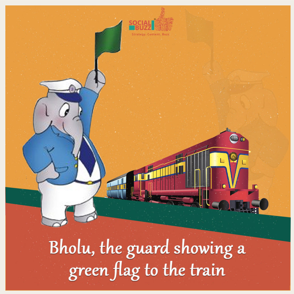 Bholu showing a green flag to the train