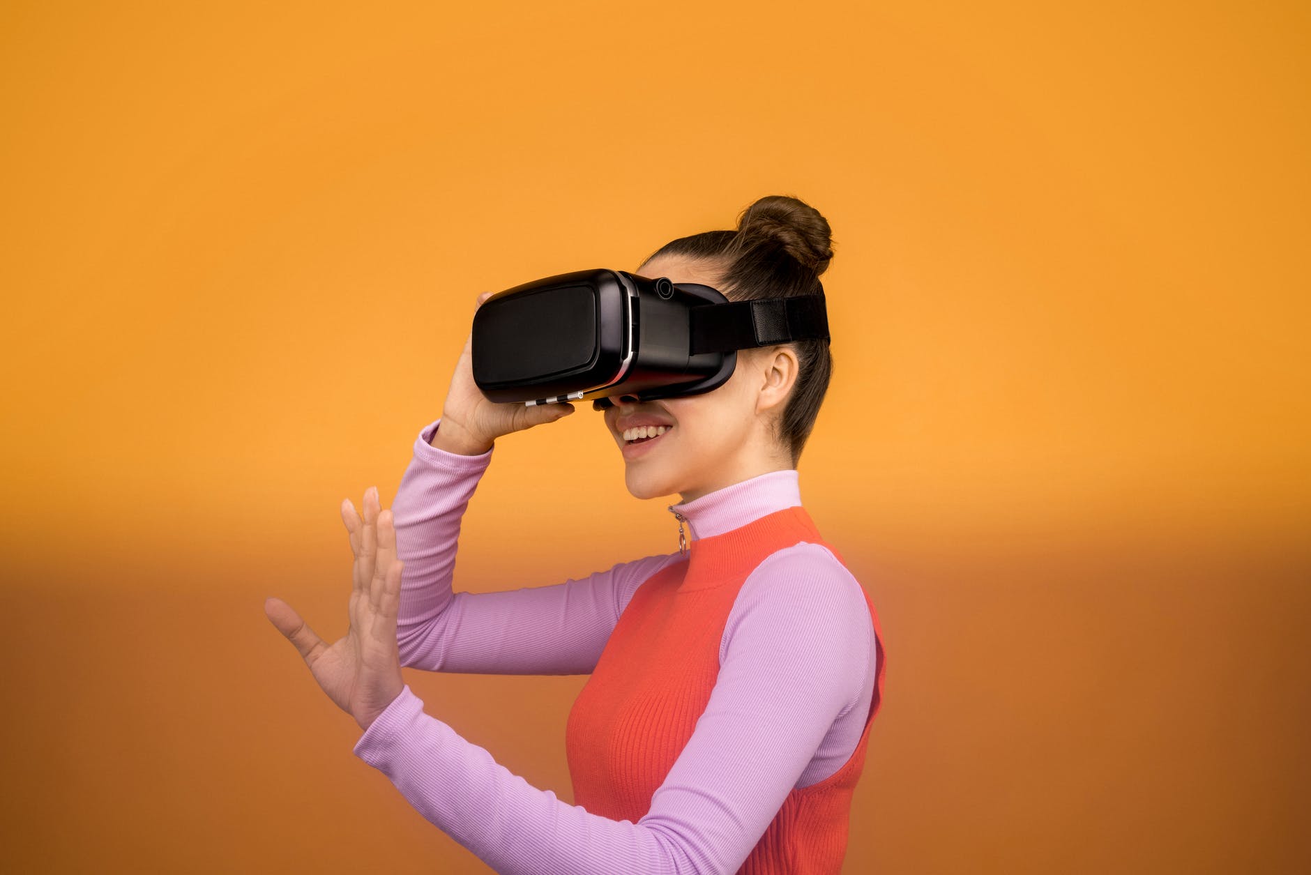woman enjoying her virtual reality goggles